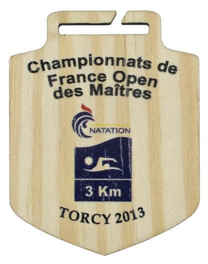 MEDALLA DE MADERA IRREGULAR